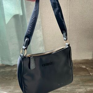 GUESS Black Shoulder Bag with Embossed Logo and Gold Zipper